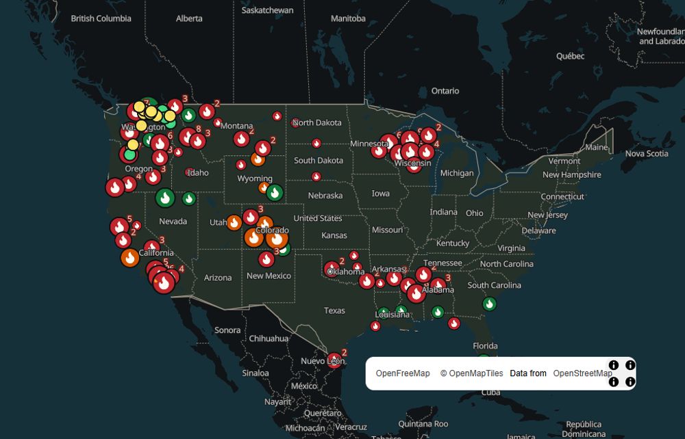 SpikeCamp national map with current US wildfires shown as flame markers